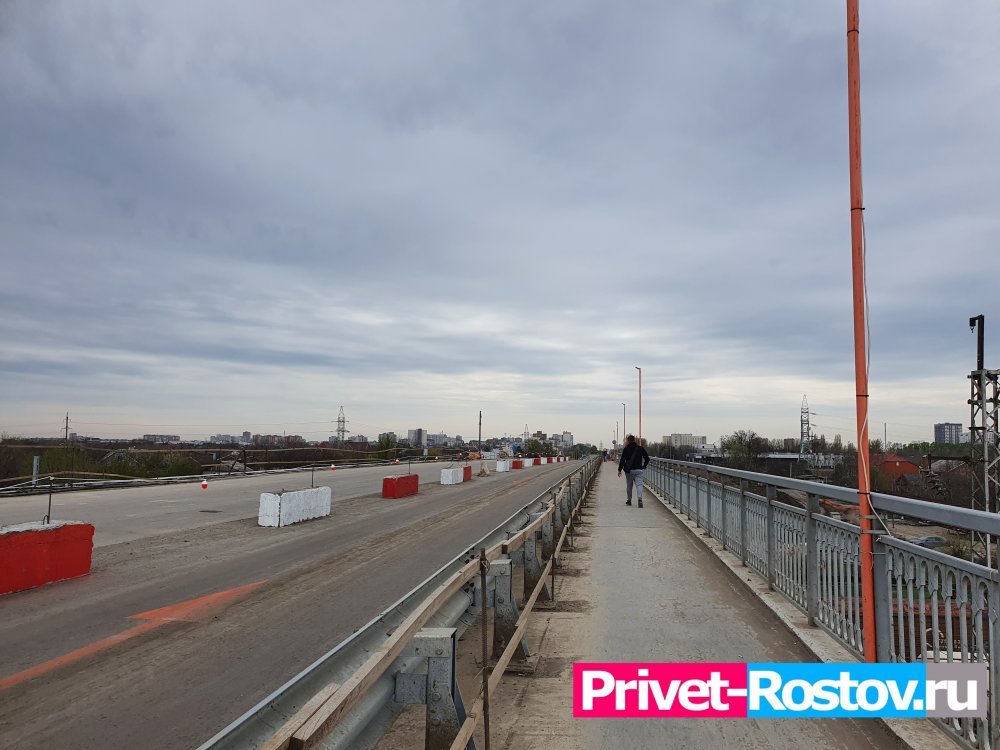 На мосту Малиновского приступили к укладке асфальта на основной путепровод